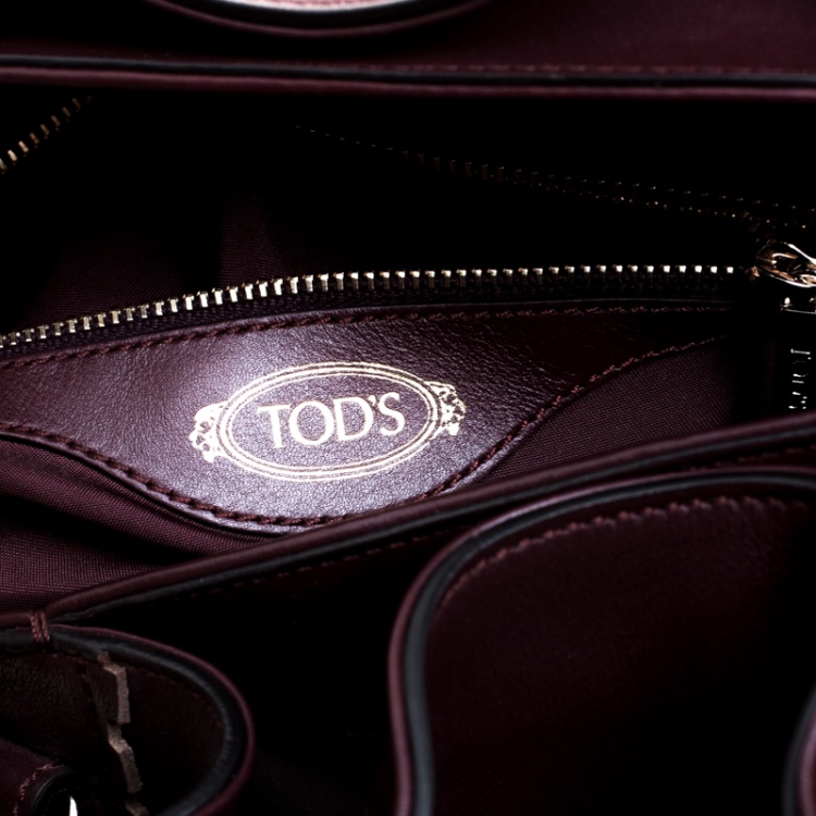 Pre Owned Tod's Burgundy Laser Cut Leather Medium Flower Tote