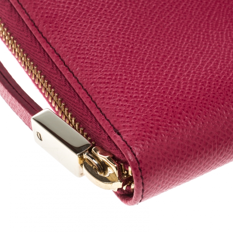 Pre Owned Tod's Fuchsia Leather Zip Around Continental Wallet