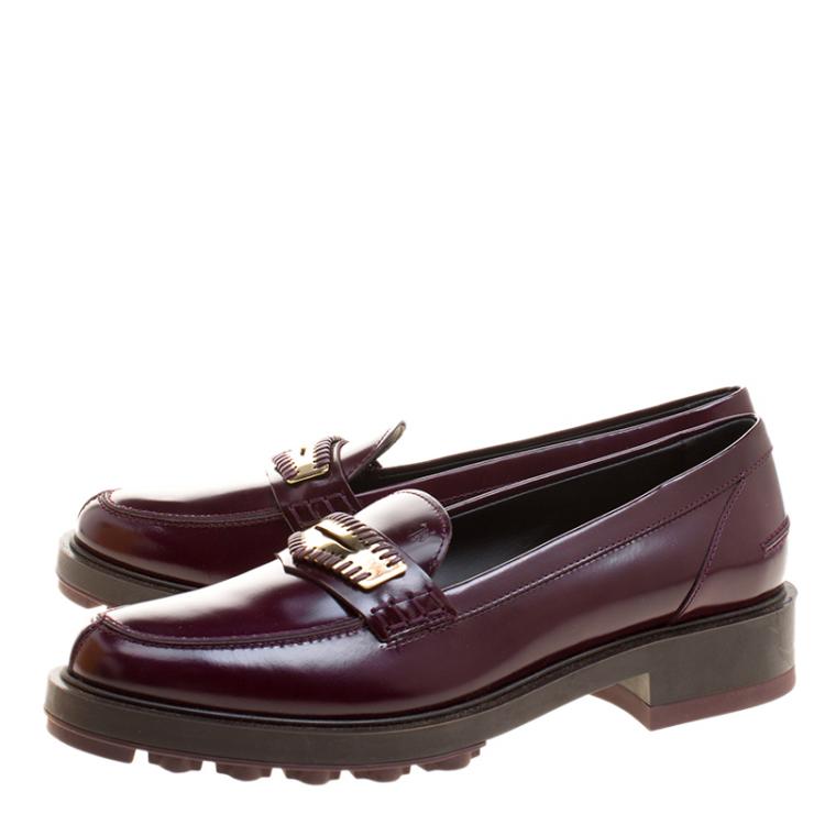 مملوكة مسبقًا Tod's Burgundy Leather Whip Stitch Penny Loafers Size 39