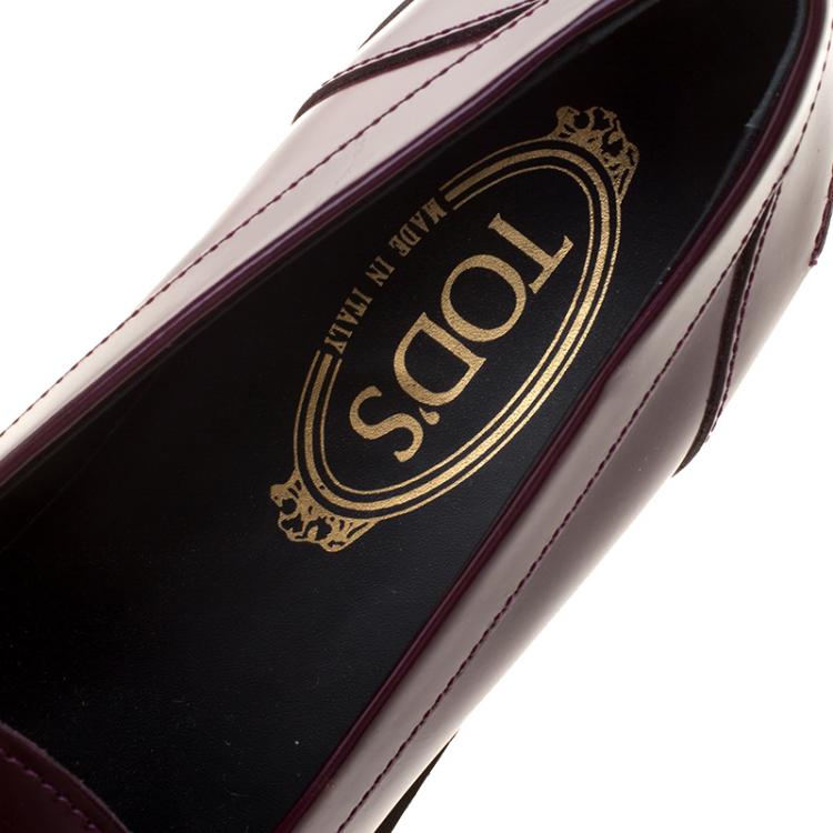 مملوكة مسبقًا Tod's Burgundy Leather Whip Stitch Penny Loafers Size 39