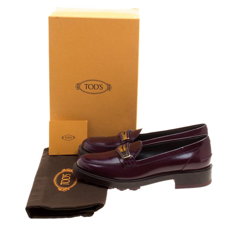 مملوكة مسبقًا Tod's Burgundy Leather Whip Stitch Penny Loafers Size 39