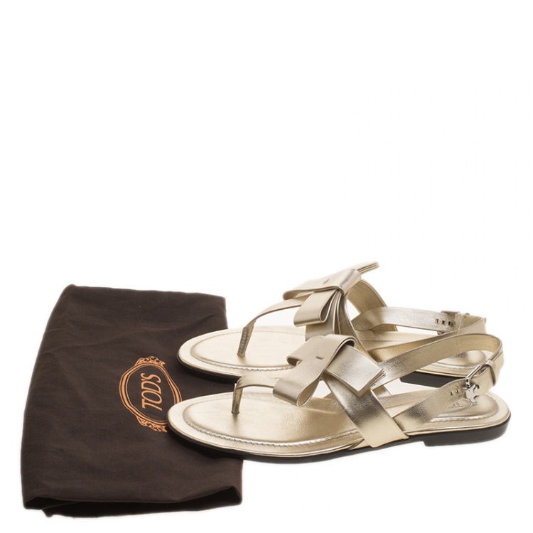 Pre Owned Tod's Metallic Gold Leather Bow Detail Flat Thong Sandals Size 37