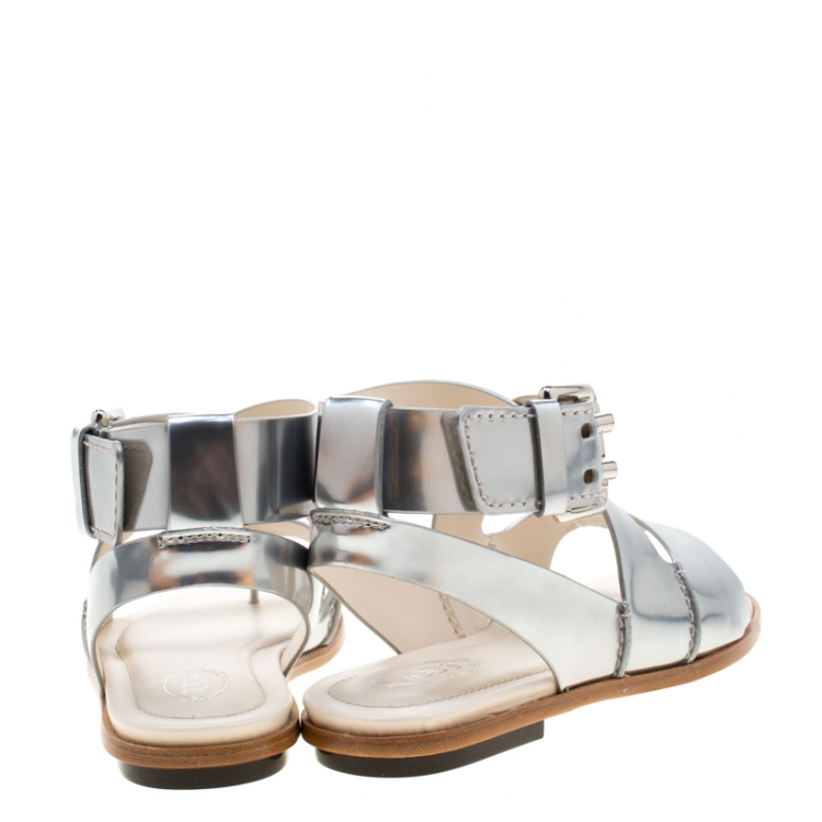 Pre Owned Tod's Metallic Silver Leather Cross Strap Flat Sandals Size 38