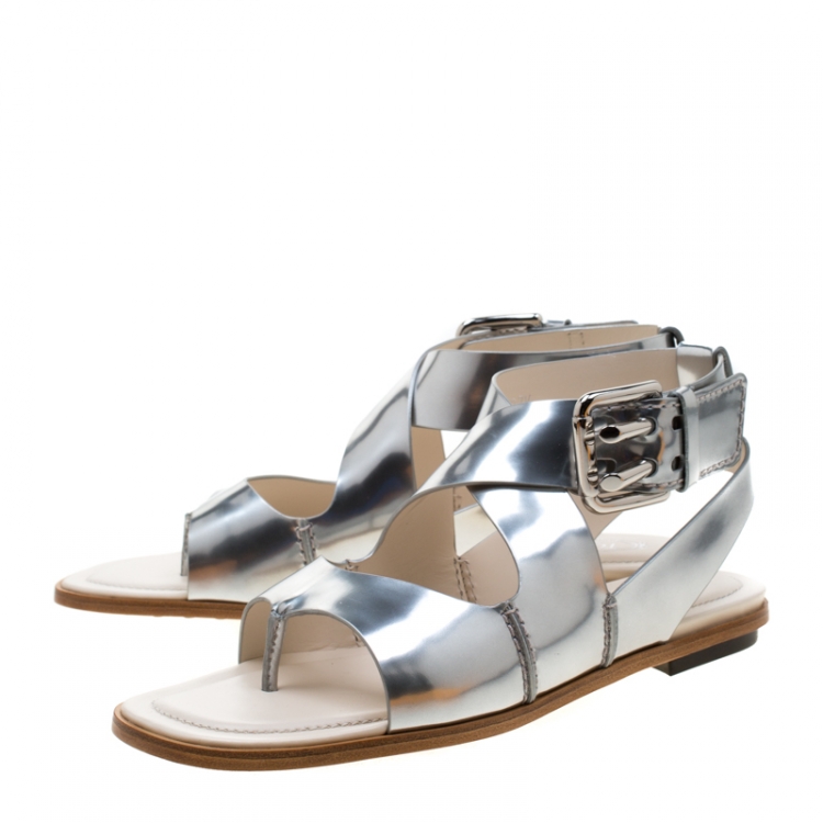 Pre Owned Tod's Metallic Silver Leather Cross Strap Flat Sandals Size 38