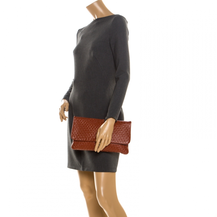 Pre Owned Tod's Dark Orange Patent Leather Signature Clutch