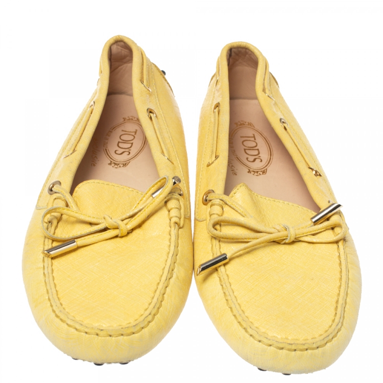 Pre Owned Tod's Yellow Foil Leather Gommino Bow Loafers Size 41