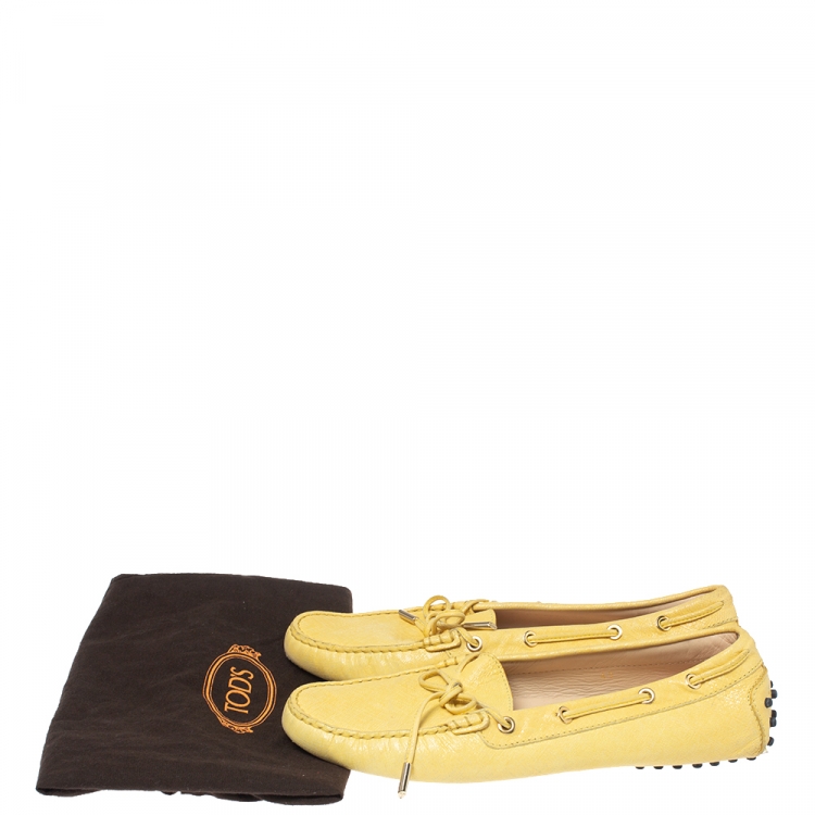 Pre Owned Tod's Yellow Foil Leather Gommino Bow Loafers Size 41