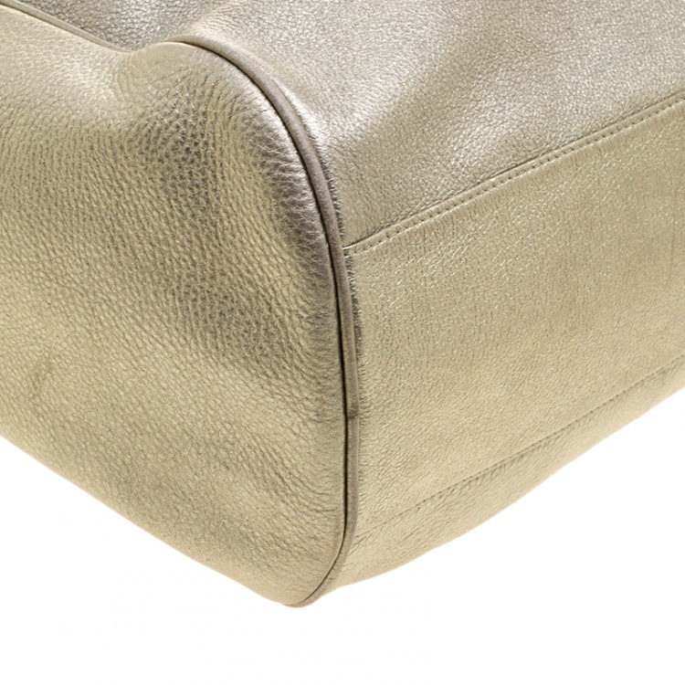 Pre Owned Tory Burch Metallic Silver Leather Perforated Logo Drawstring Tote with Pochette Accessories 