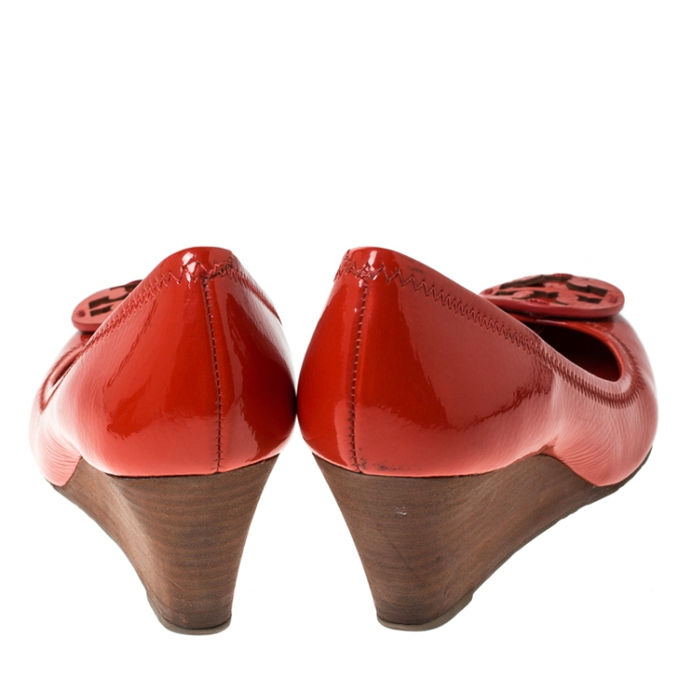 Pre Owned Tory Burch Orange Patent Leather Sophie Wedge Pumps Size 36