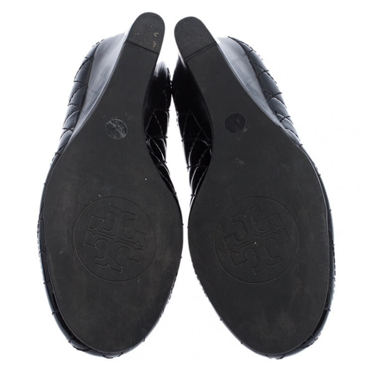 Pre Owned Tory Burch Black Quilted Patent Leather Reva Logo Studded Wedge Pumps Size 36