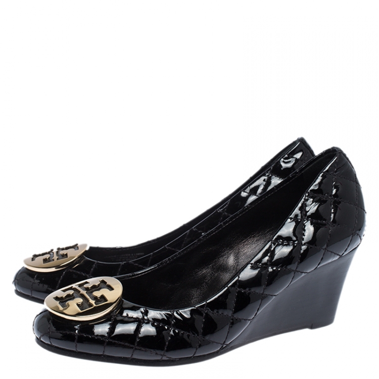 Pre Owned Tory Burch Black Quilted Patent Leather Reva Logo Studded Wedge Pumps Size 36