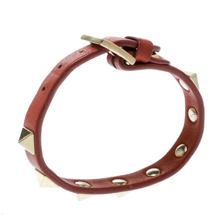 Pre Owned Valentino Rockstud Orange Leather Gold Tone Bracelet