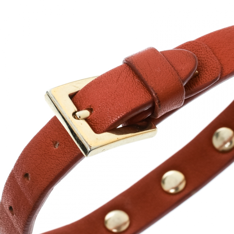 Pre Owned Valentino Rockstud Orange Leather Gold Tone Bracelet