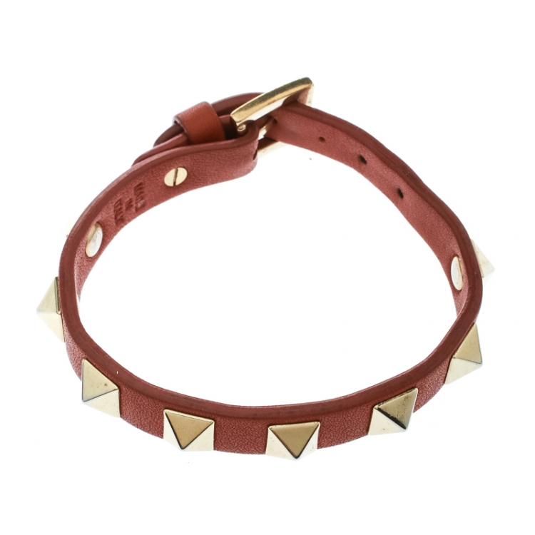 Pre Owned Valentino Rockstud Orange Leather Gold Tone Bracelet