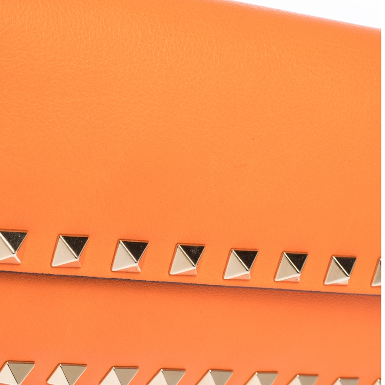 Pre Owned Valentino Neon Orange Leather Rockstud Bracelet Clutch