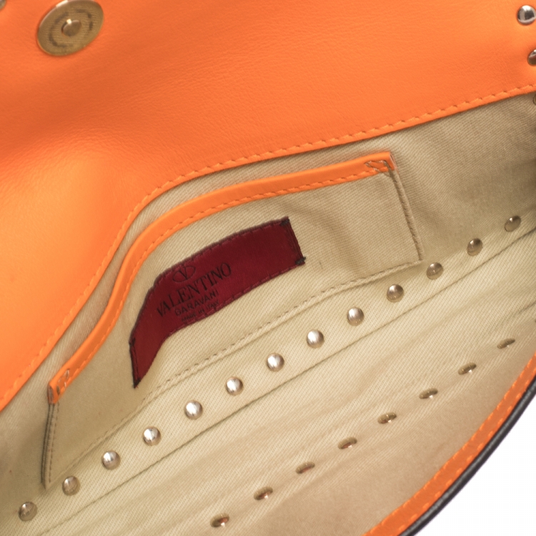 Pre Owned Valentino Neon Orange Leather Rockstud Bracelet Clutch