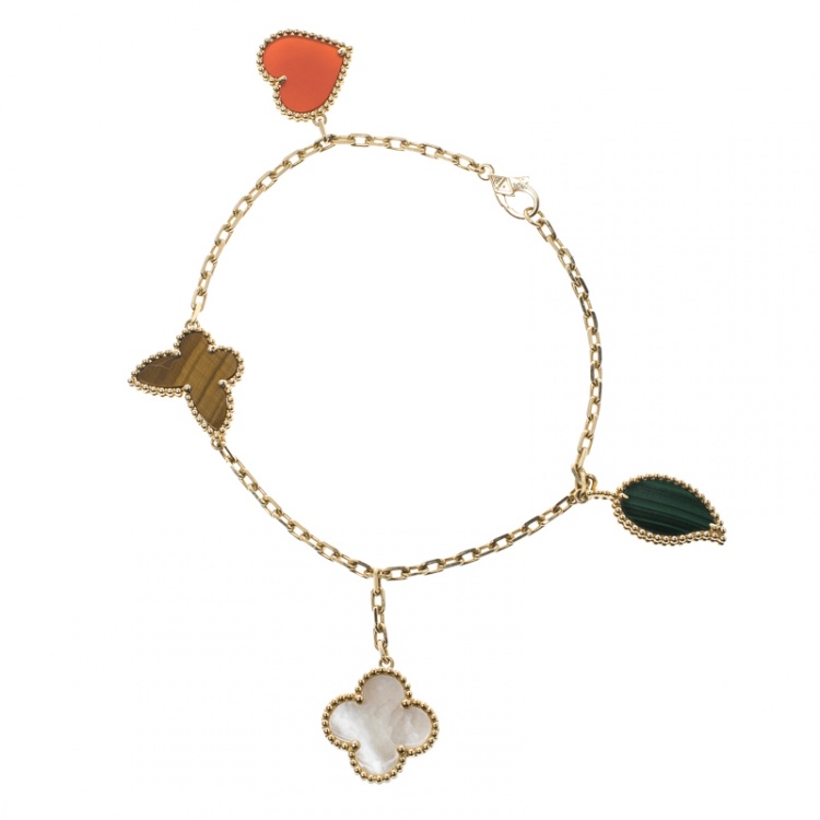 Van Cleef and Arpels Yellow Gold Lucky Alhambra 4 Motif Bracelet VCARD79600  For Sale at 1stDibs