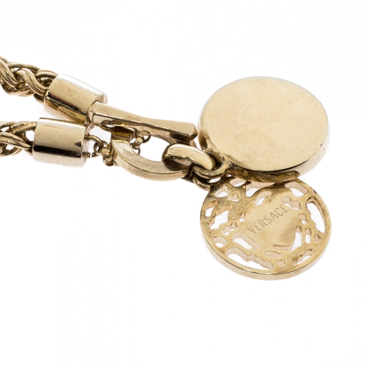 Pre Owned Versace Gold Tone Crystal and Medusa Charm Woven Chain Toggle Necklace 