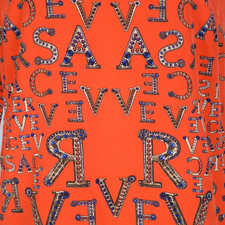 Pre Owned Versace Orange Logo Alphabet Printed Silk Long Sleeve Shift Dress M 