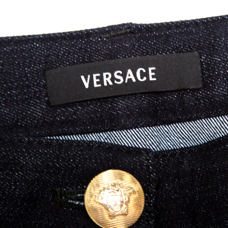 Pre Owned Versace Indigo and Black Dark Wash Denim Paneled Zip Detail Tapered Jeans S