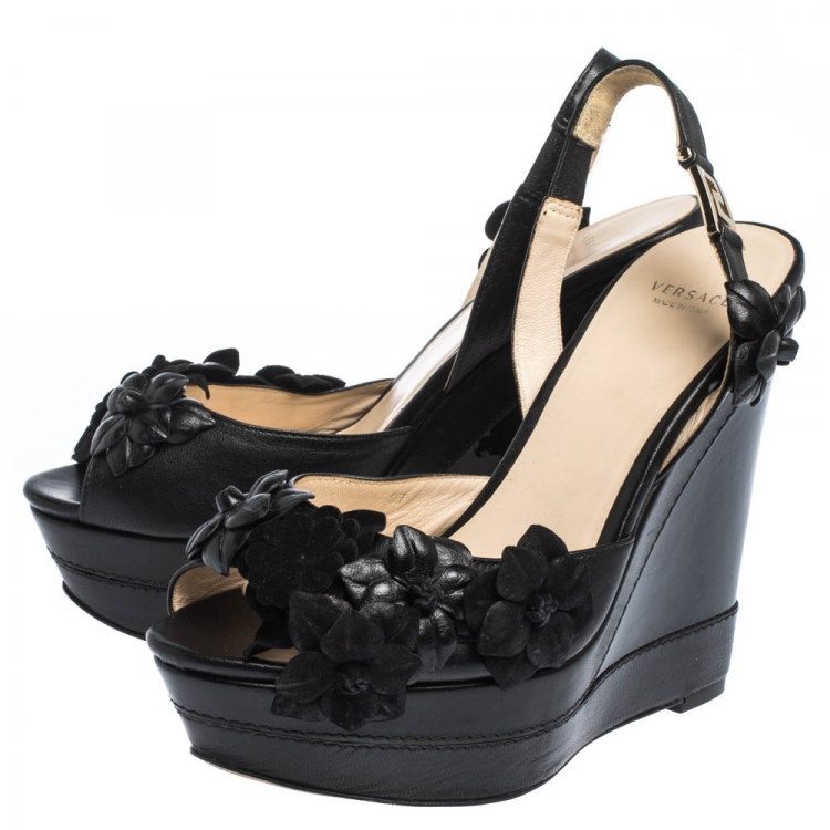 مملوكة مسبقًا Versace Black Leather And Suede Flower Embellished Wedge Platform Slingback Sandals Size 37