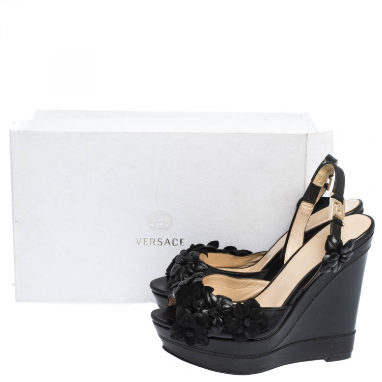 مملوكة مسبقًا Versace Black Leather And Suede Flower Embellished Wedge Platform Slingback Sandals Size 37