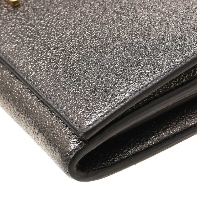Pre Owned Saint Laurent Metallic Dark Beige Textured Leather Monogram Cassandre Clutch