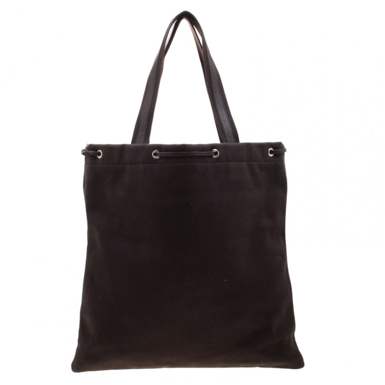 Pre Owned Saint Laurent Paris Brown Canvas and Leather Drawsting Kahala Tote 