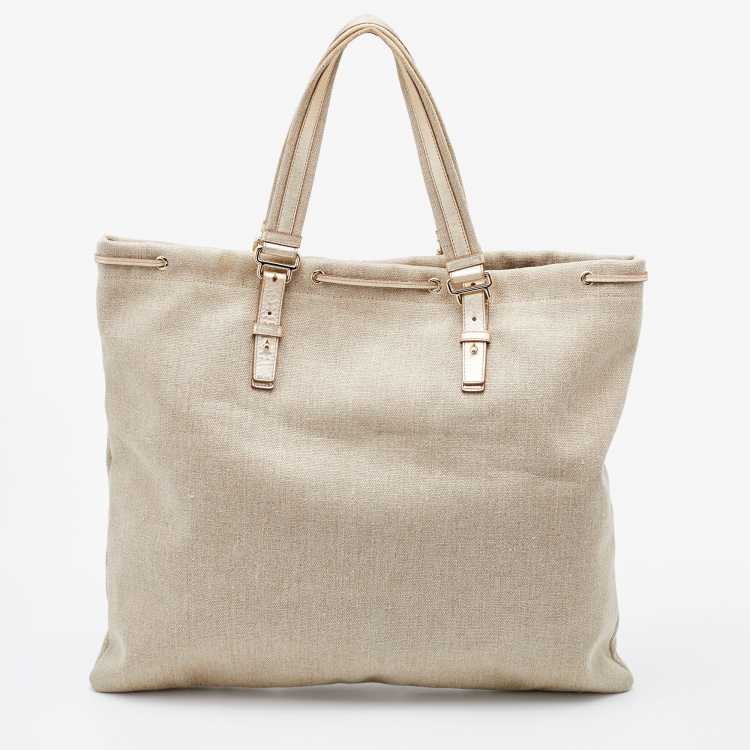 Pre Owned Yves Saint Laurent Beige/Gold Canvas and Leather Drawstring Shopper Tote