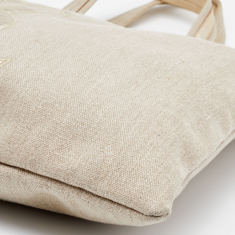 Pre Owned Yves Saint Laurent Beige/Gold Canvas and Leather Drawstring Shopper Tote