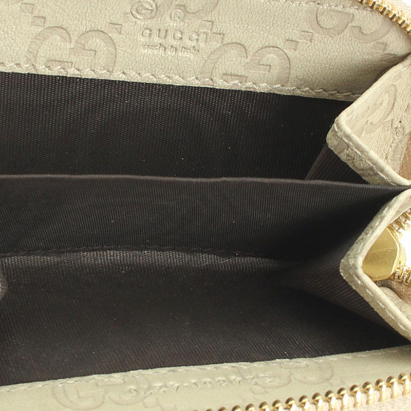 

Gucci Cream Guccissima Leather Zip Around Card Case