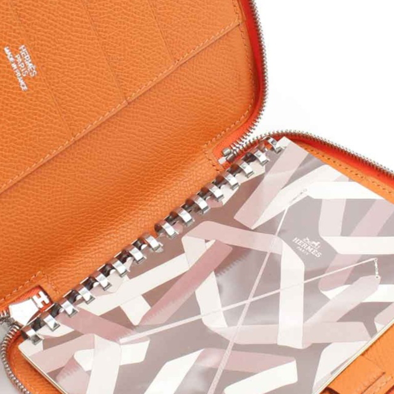 

Hermes Orange Leather Globe Trotter Zip Around Agenda