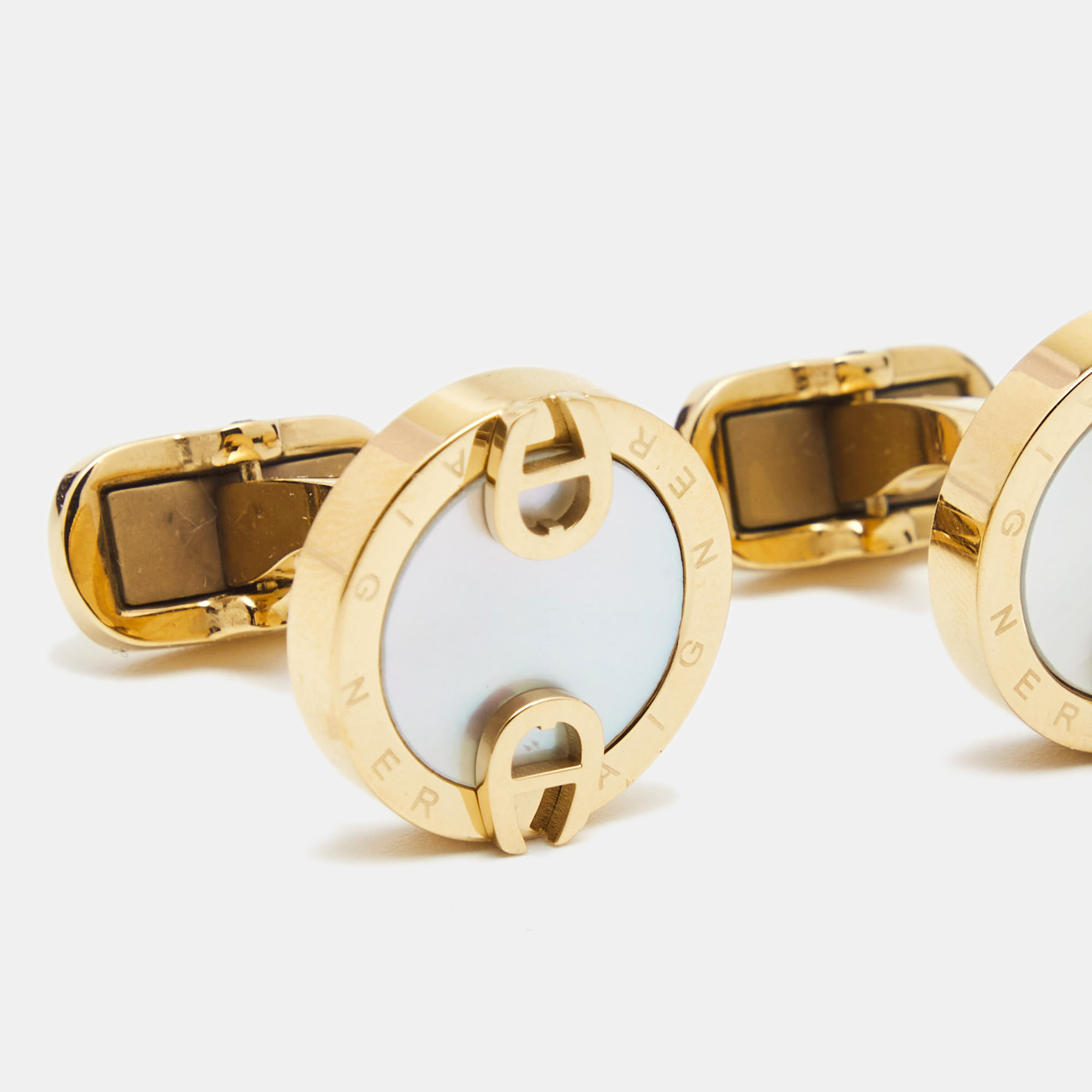

Aigner Mother of Pearl Gold Tone Cufflinks