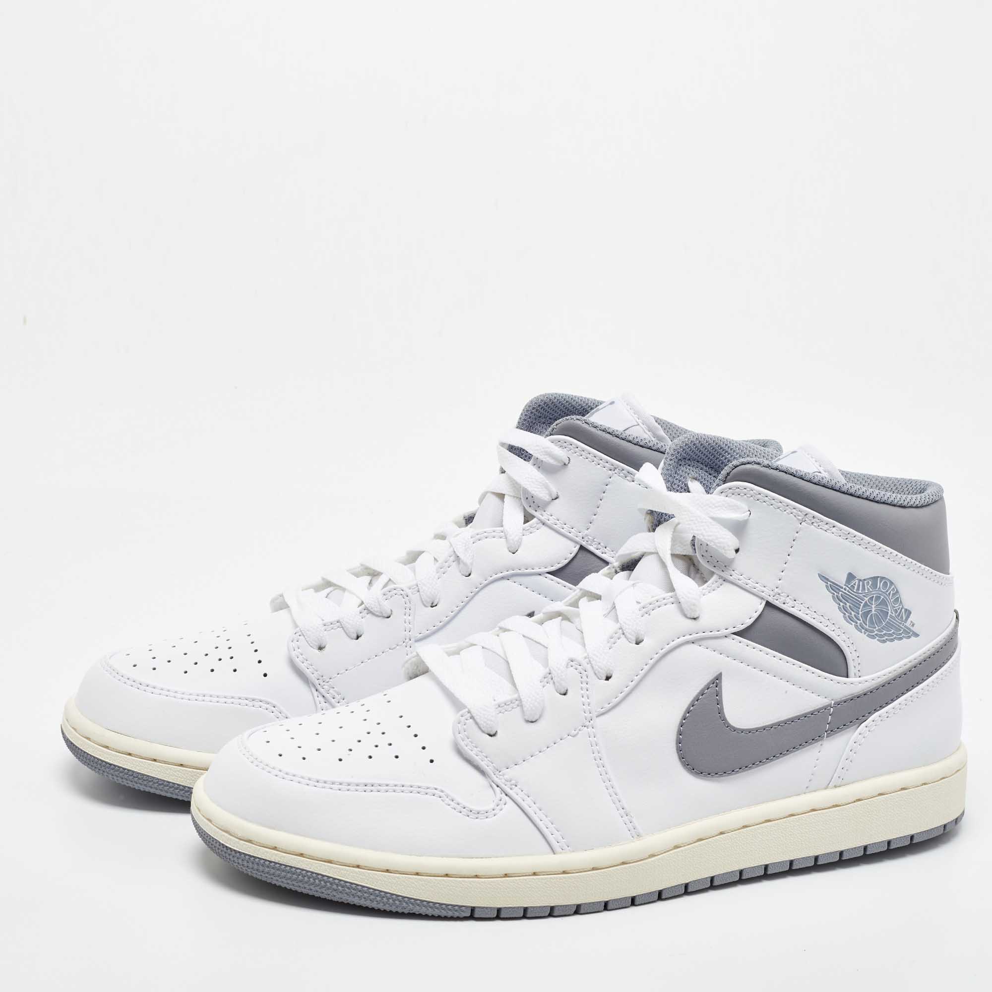

Air Jordans White/Grey Leather Jordan 1Mid Neutral Grey Sneakers Size