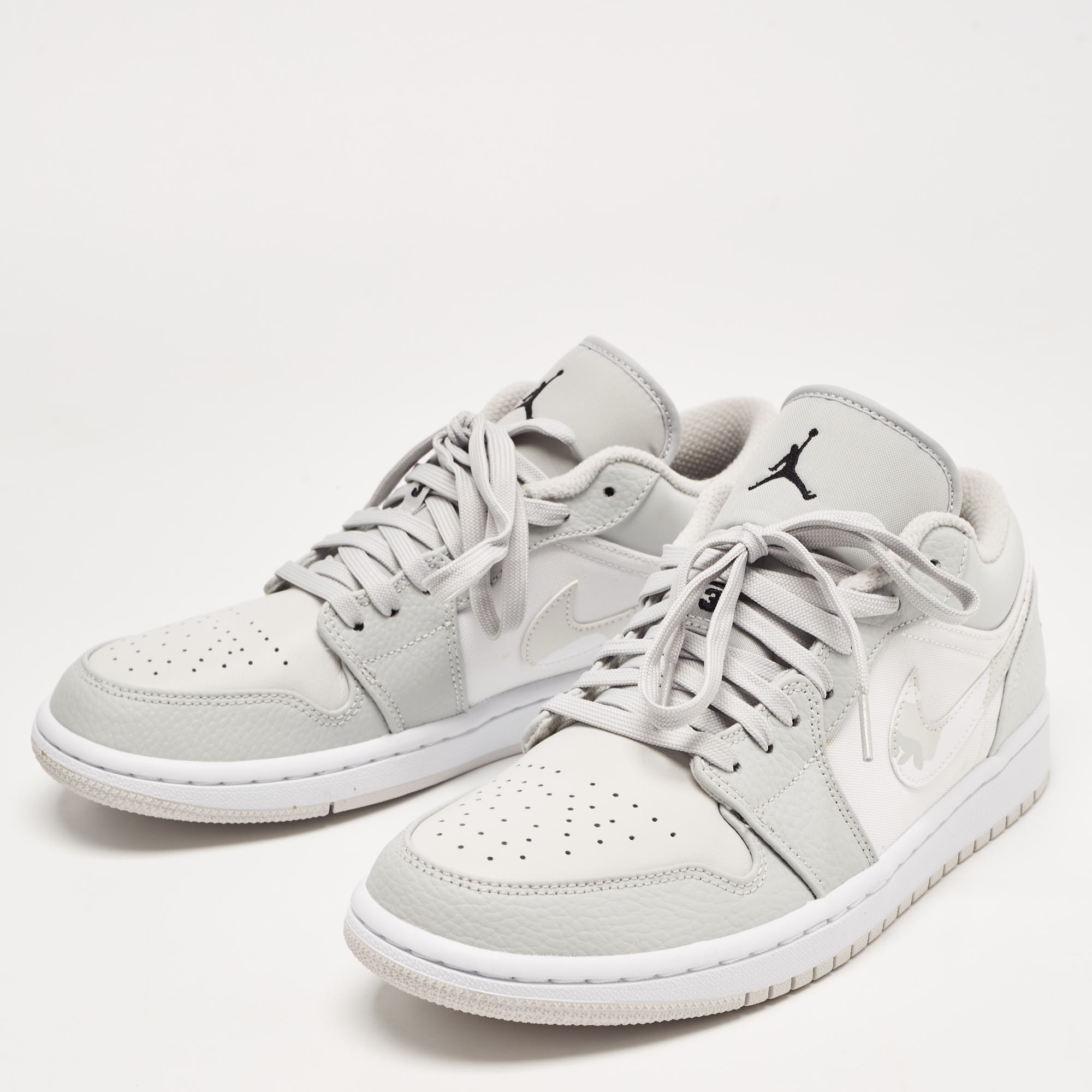 

Air Jordan Grey/White Leather and Canvas 1 Low Top Sneakers Size