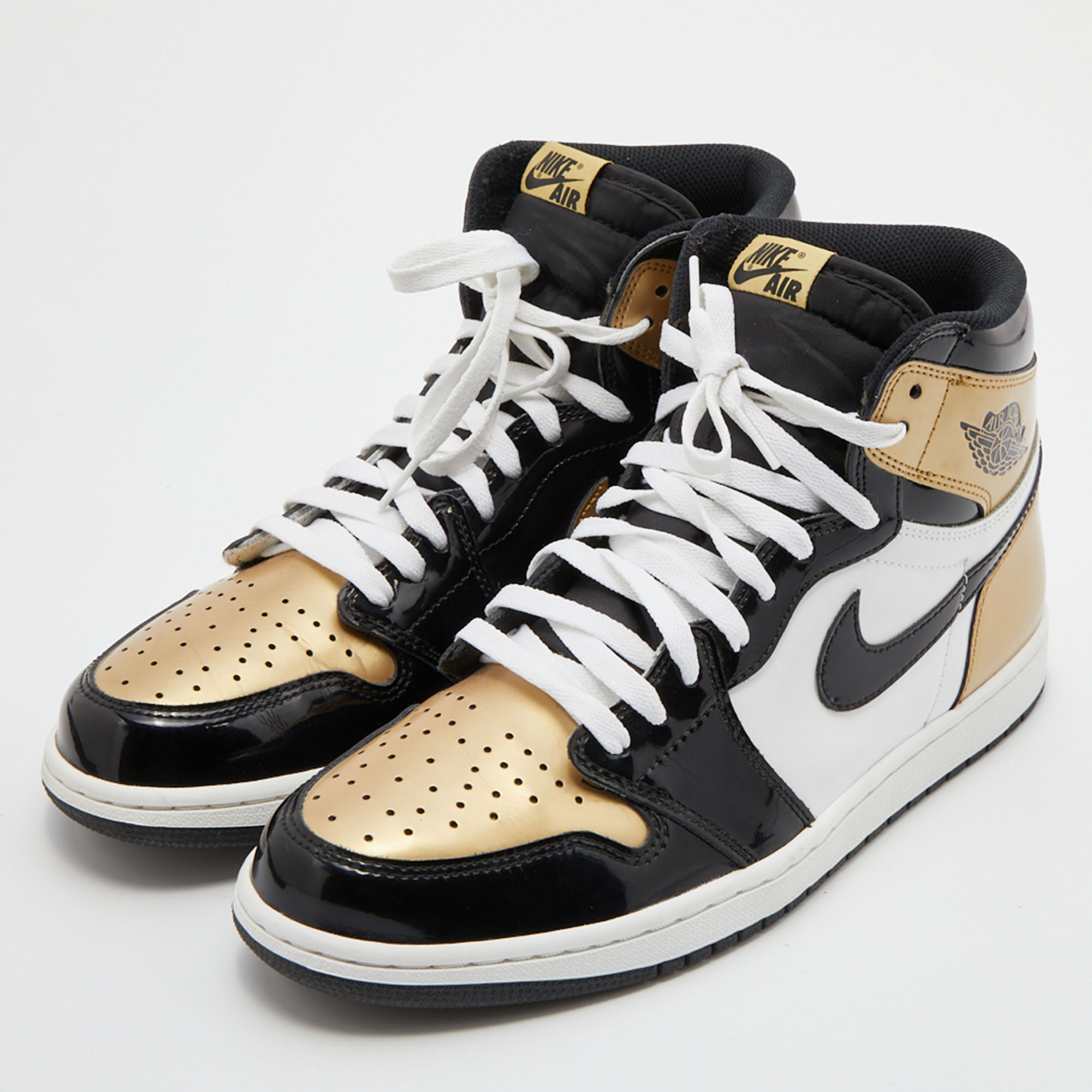 

Air Jordans Black/Gold Patent Leather Air Jordan 1 Retro High Top Sneakers Size