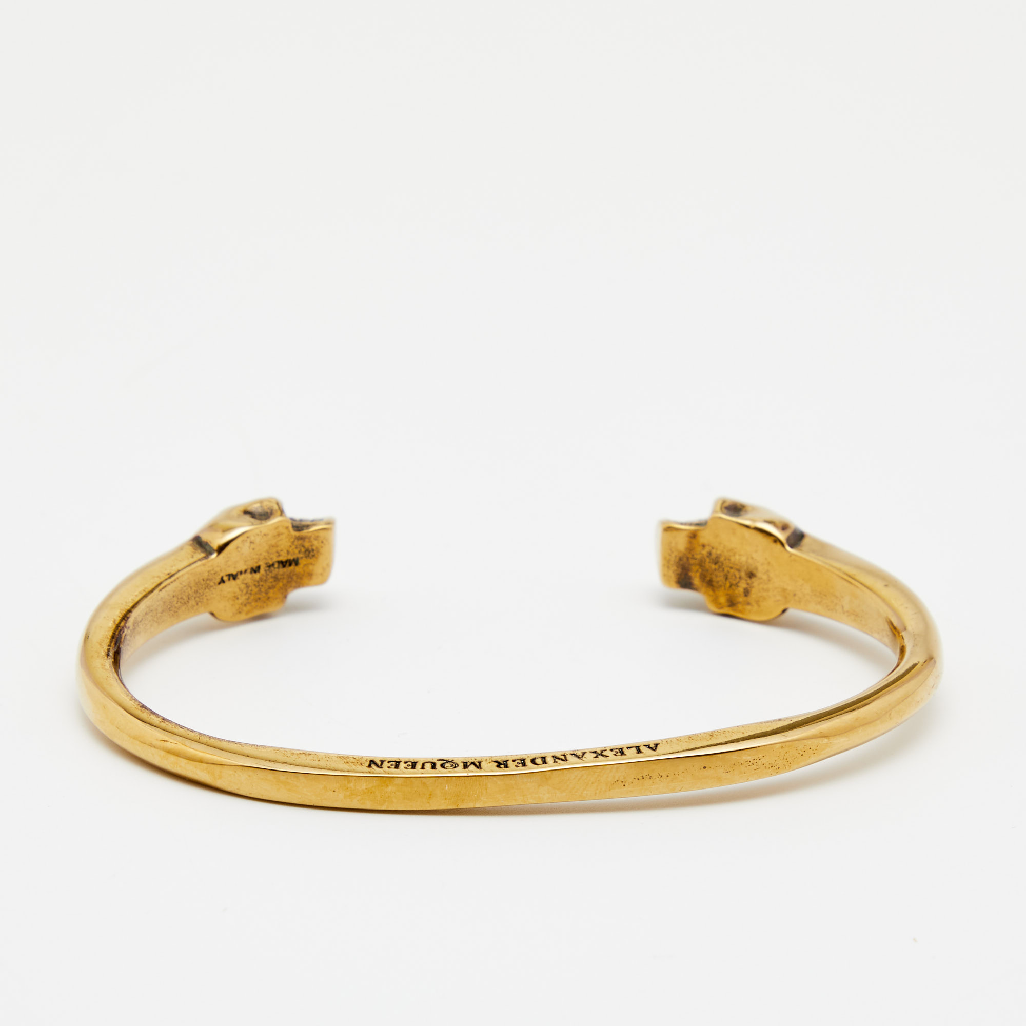 

Alexander McQueen Gold Tone Skull Cuff Bracelet