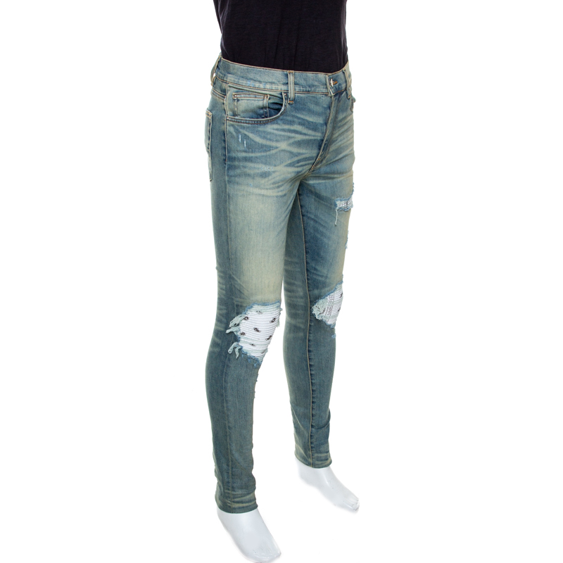 

Amiri Dirty Indigo Distressed Denim Bandana Patch Jeans, Blue