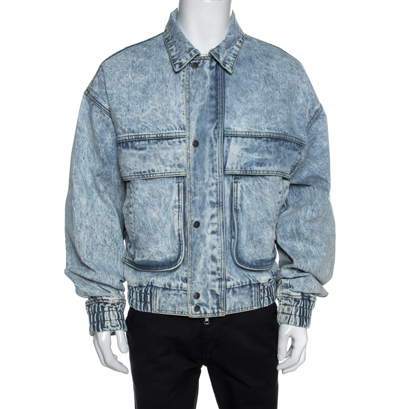 Grab this stylish bomber jacket by Amiri and elevate your casual style instantly. Crafted from 100% cotton this acid washed denim jacket comes in a lovely shade of blue. It is styled with a zip front four pockets simple collar fitted trims along the hemline and long sleeves. Pair with jeans and sneakers.