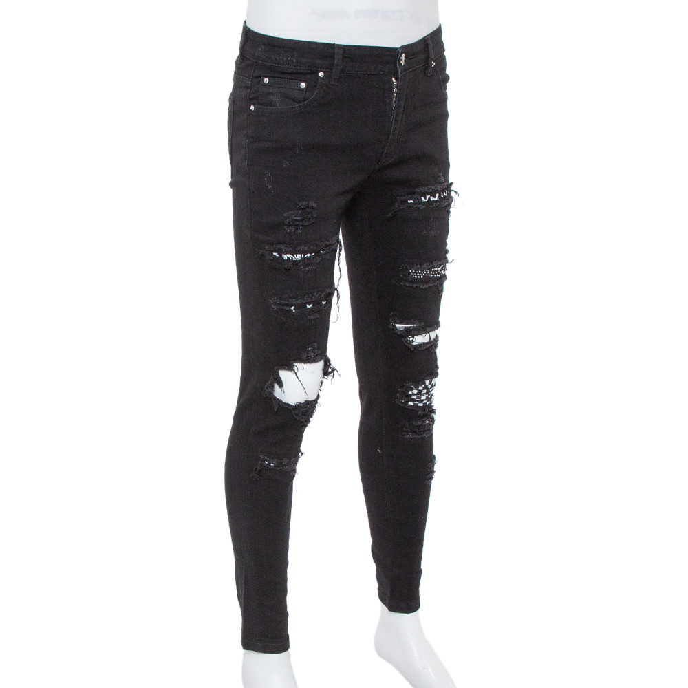 

Amiri Black Denim Art Patch Distressed Skinny Jeans