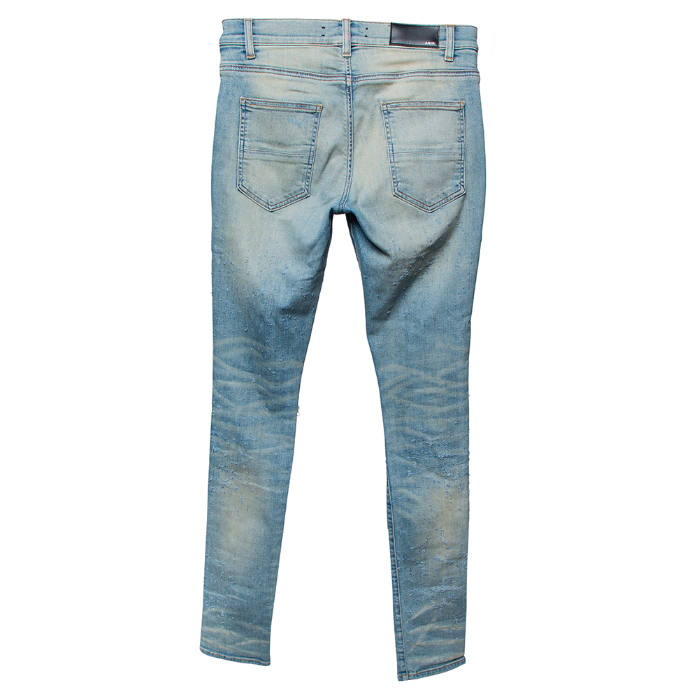 

Amiri Blue Light Wash Denim Distressed Jeans