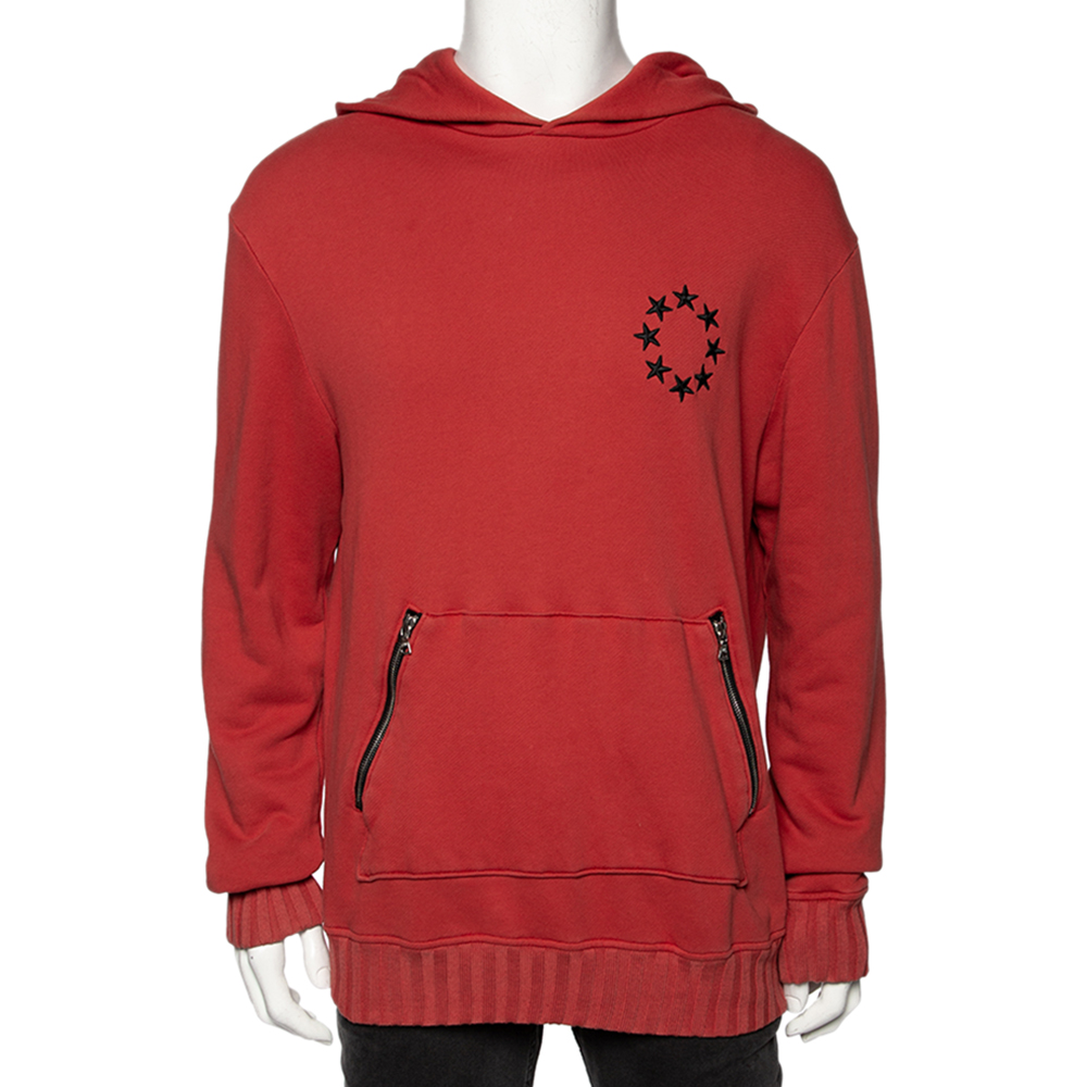 Stylish yet comfortable this hoodie from Amiri is just what you need to add to your closet. The cotton hoodie flaunts an orange shade and a star circle embroidery on the front left side. It also features long sleeves and two zipper pockets in the front making it suitable for daily use.