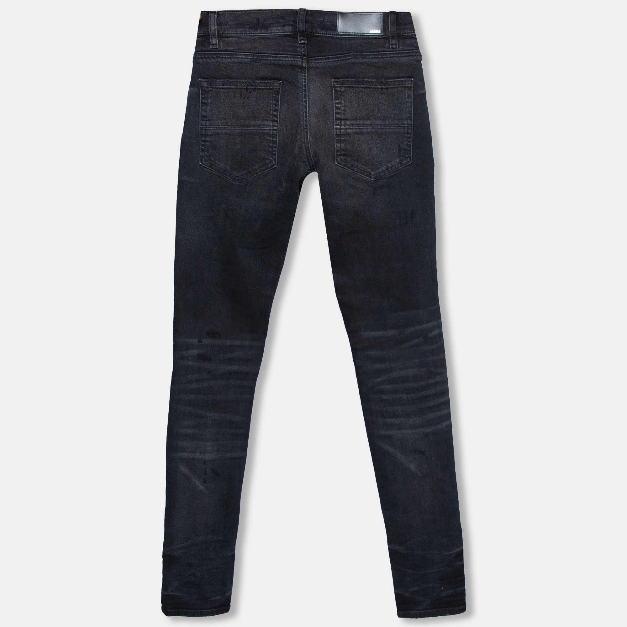 

Amiri Aged Black Denim Distressed Art Patch Jeans