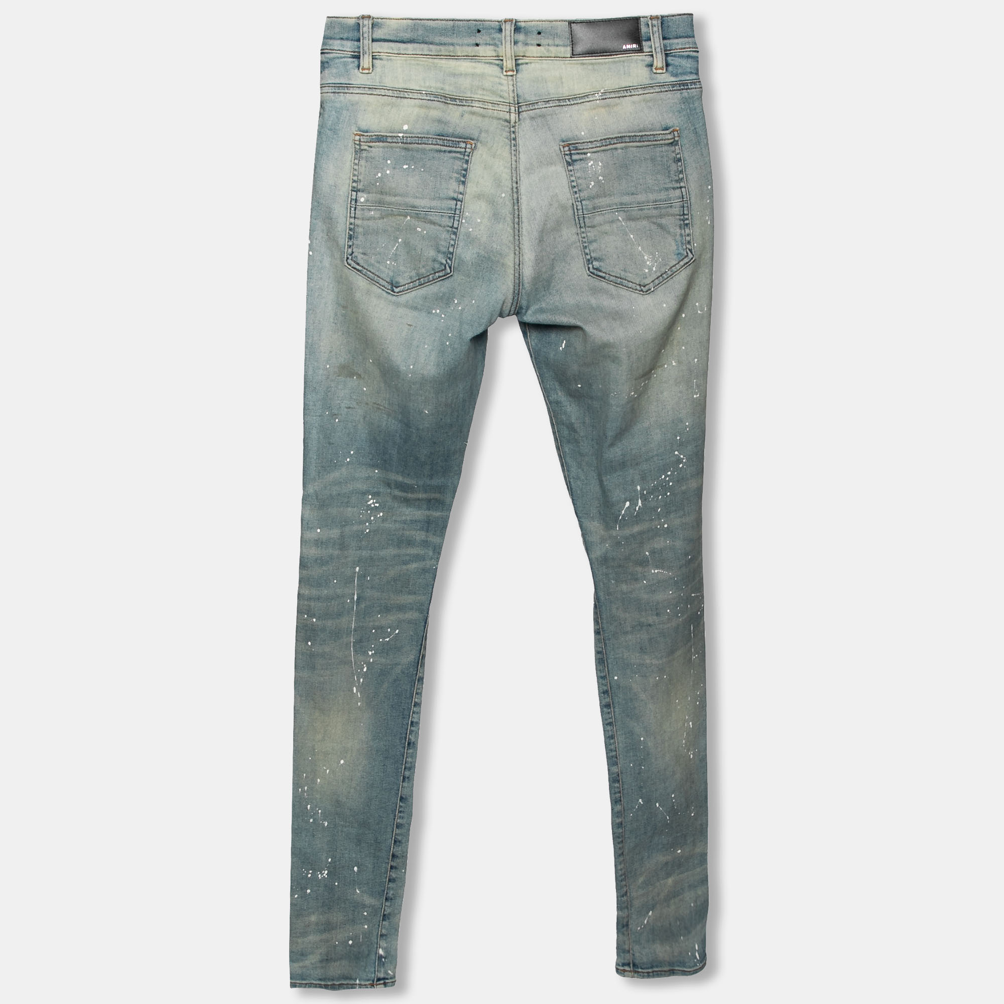 

Amiri Blue Distressed Denim Patch Applique Detailed Slim Fit Jeans