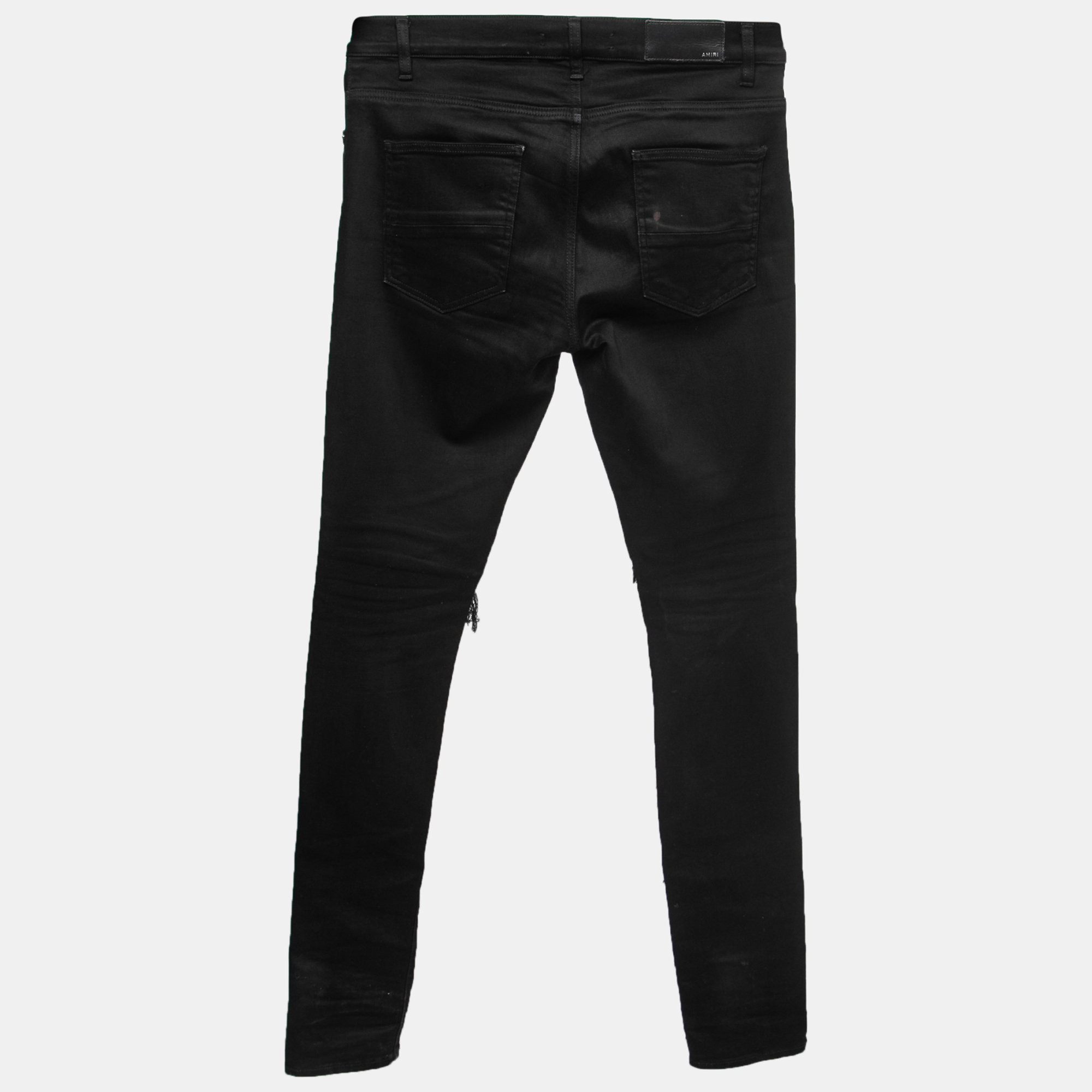 

Amiri Black Distressed Denim Panelled Skinny Jeans  Waist 32