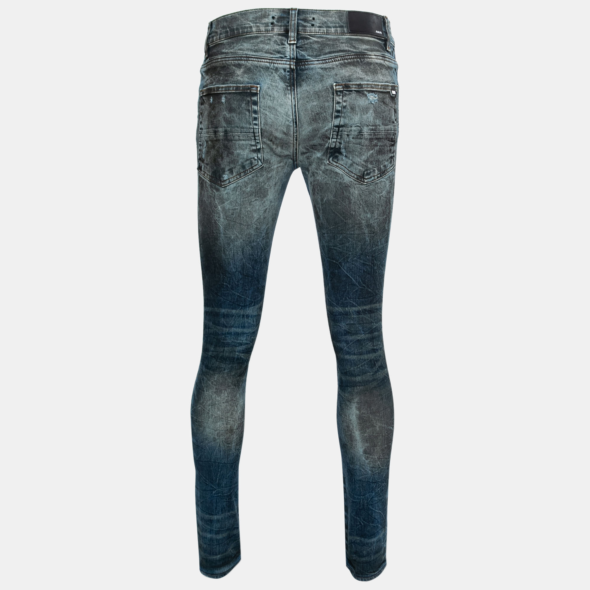 

Amiri Blue Distressed Denim Ripped-Detail Skinny Jeans  Waist 32