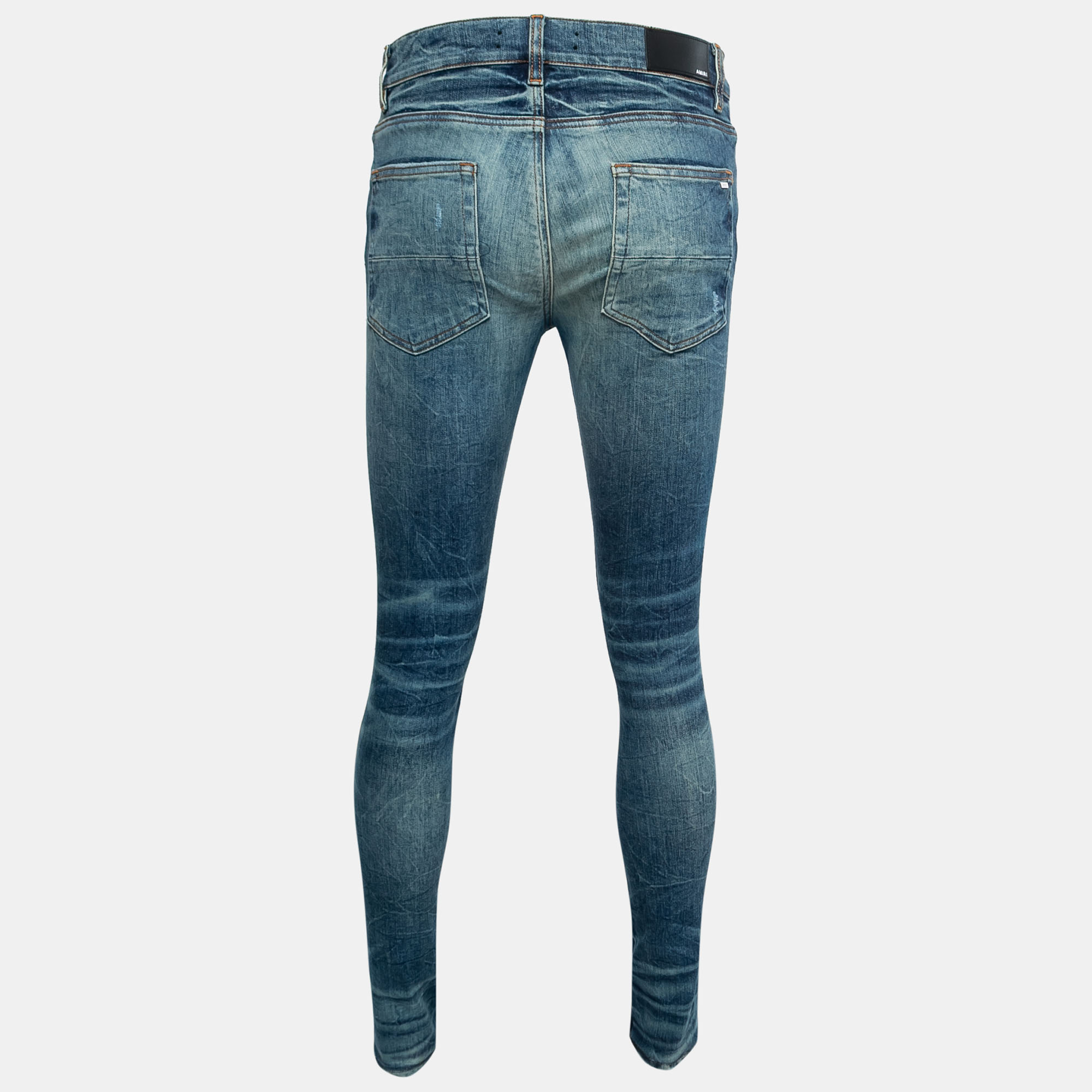 

Amiri Blue Distressed Ripped-Detail Denim Jeans  Waist 32