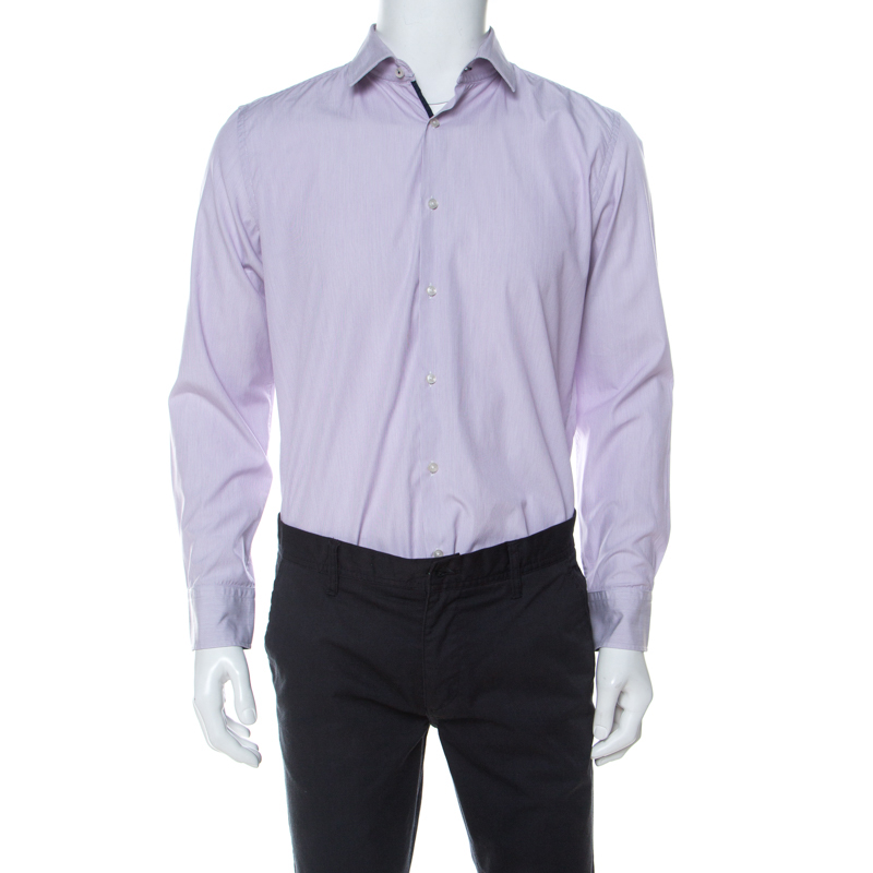 Tailored with precision using cotton this lilac pinstriped shirt from Boss by Hugo Boss will be a staple addition to your closet. It has long sleeves a classic collar and full front buttons. It will add to your formal style.