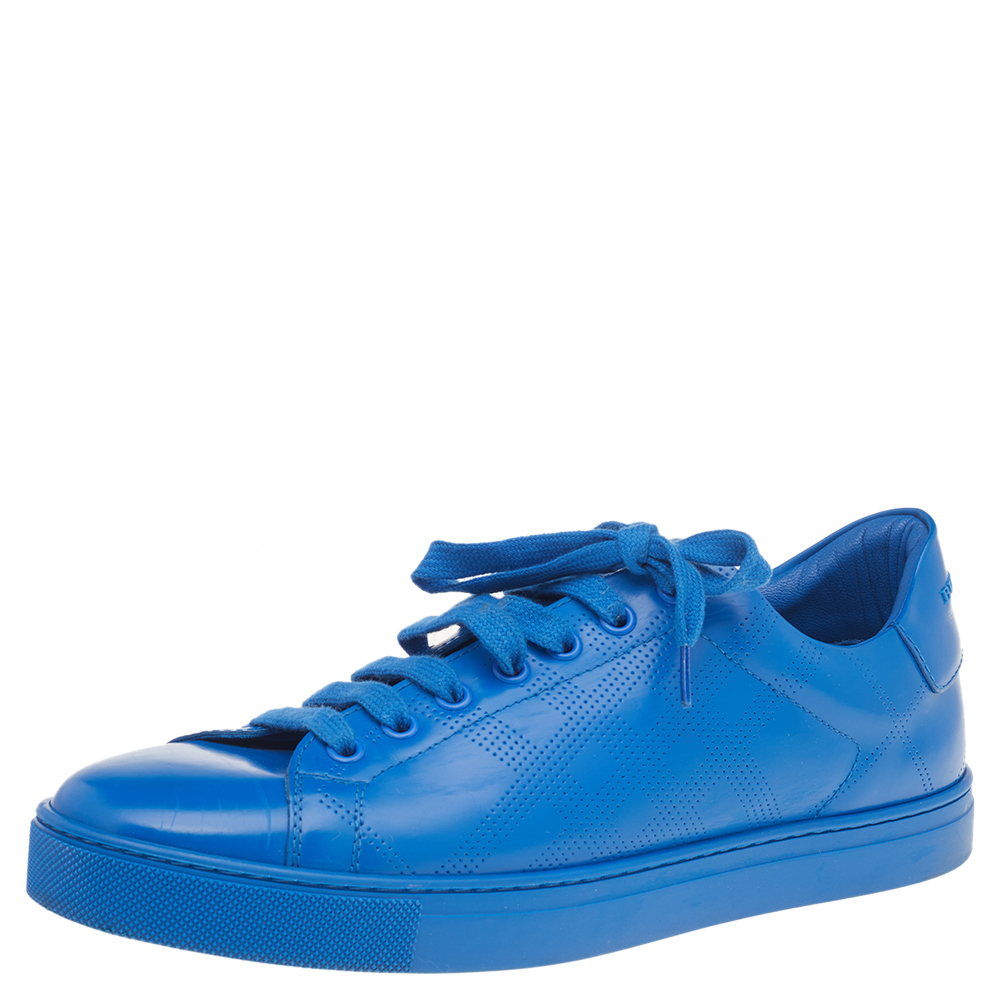 These Albert sneakers are the comfiest ones you will ever have Give your look a stylish spin with these Burberry sneakers made from leather. They flaunt a perforated check pattern round toes and logo accented heels. Coming in a classy blue hue these sneakers feature a low top frame and tongues that ensure a comfortable stride.