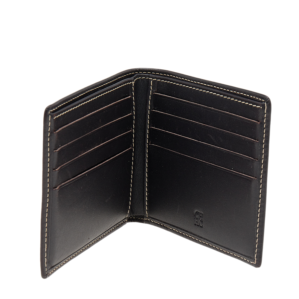 

Carolina Herrera Dark Brown Monogram Embossed Leather Bifold Wallet
